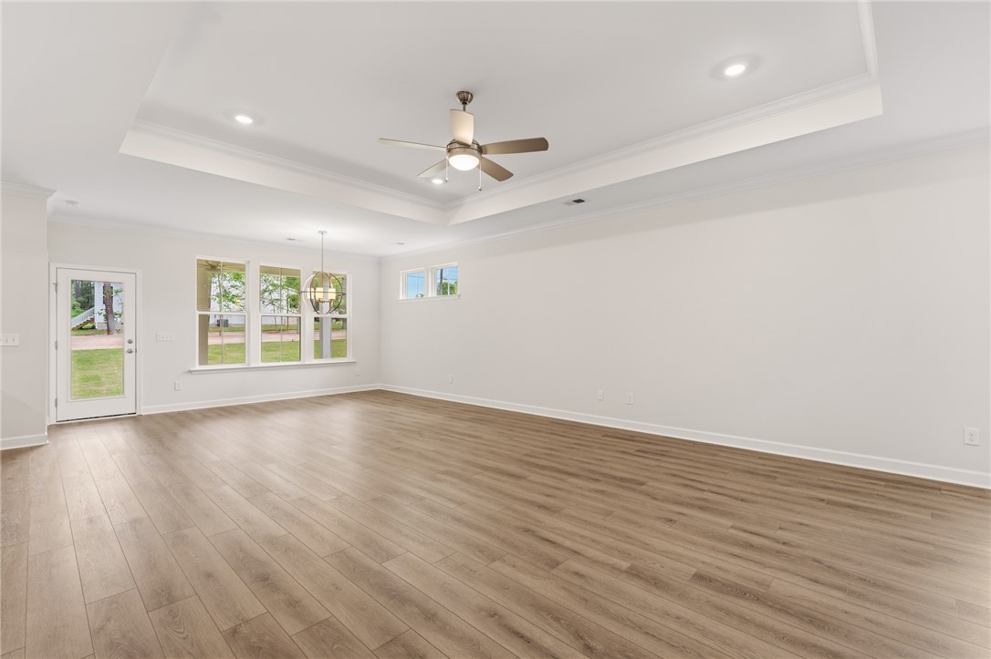 110 Lakeside Drive Anderson, SC 29621 - Photo 8 of 34 This expansive room offers natural light, creating an inviting and airy atmosphere.