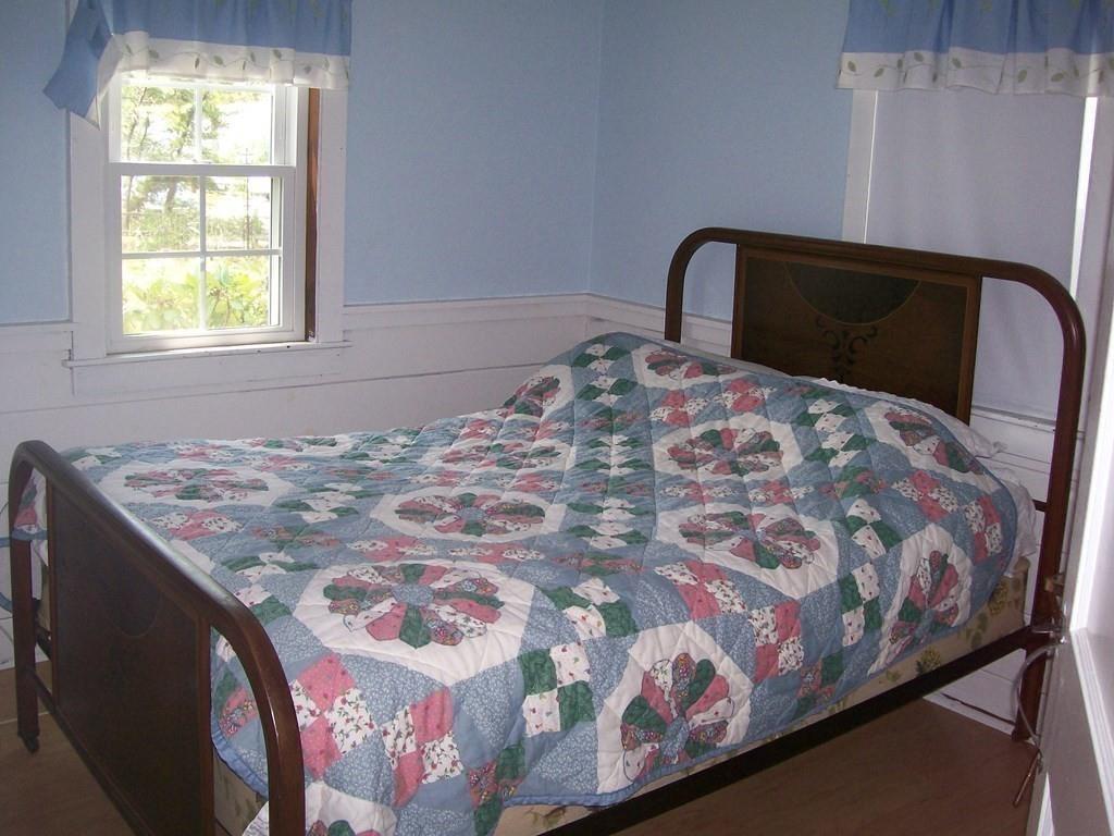 4 Hassan Road Dennis, MA 02639 - Photo 17 of 25 a bedroom with a bed and a window