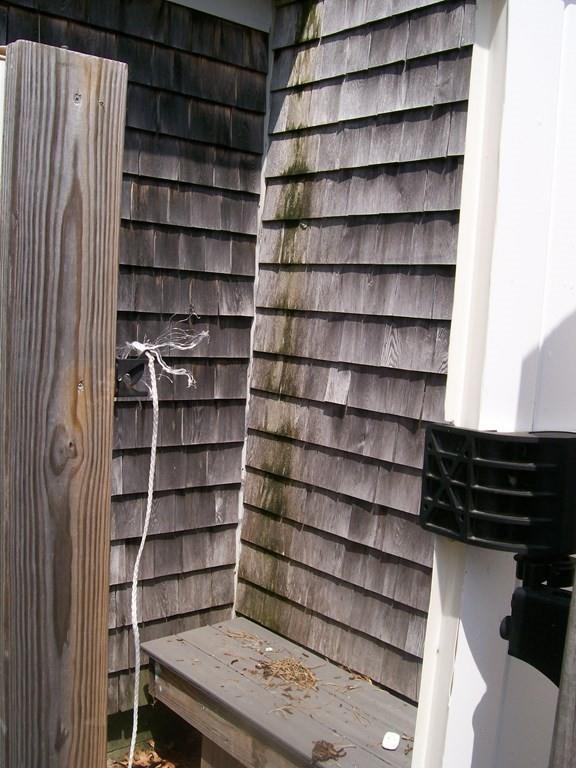 4 Hassan Road Dennis, MA 02639 - Photo 22 of 25 a view of a room with wooden floor and shelf