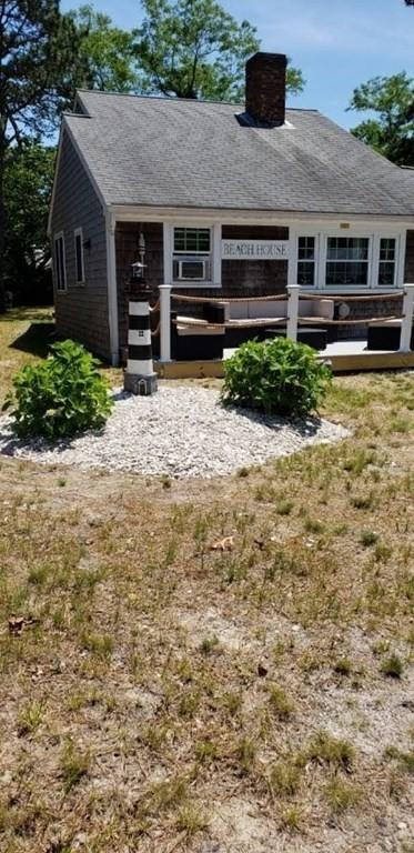 4 Hassan Road Dennis, MA 02639 - Photo 4 of 25 a view of a house with a yard