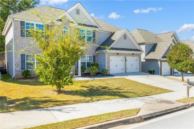 a view of a house with a swimming pool