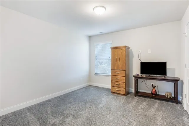 a view of a livingroom with furniture