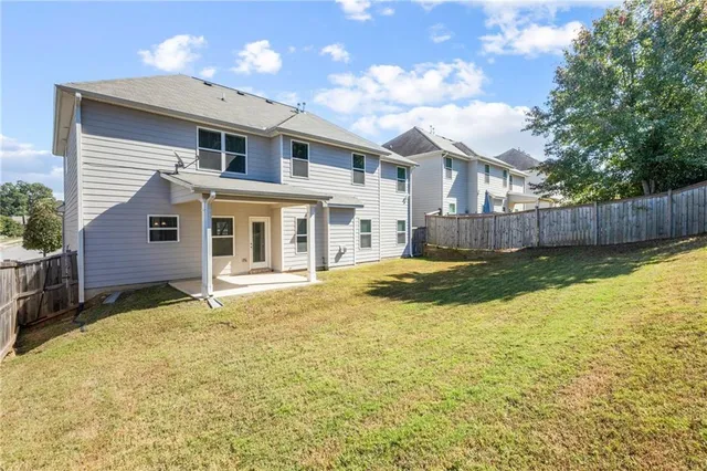 a view of a house with a swimming pool