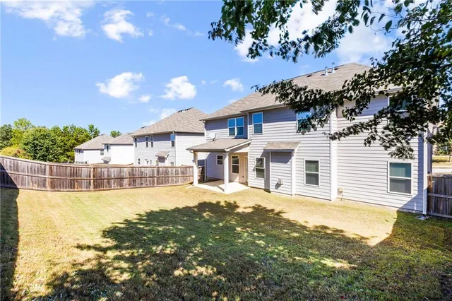 a picture of a book and a bed