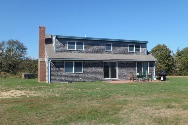 50 A Carl's Way West Tisbury, MA 02568 - Photo 1 of 19 a front view of a house with a yard