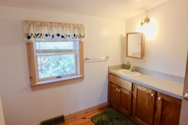 50 A Carl's Way West Tisbury, MA 02568 - Photo 15 of 19 a bathroom with a sink and a mirror