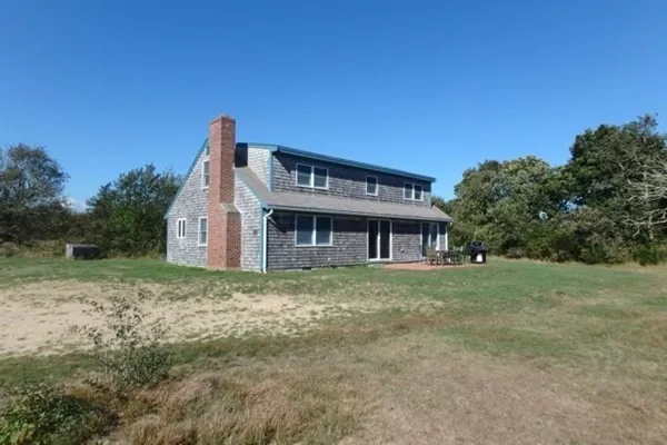 a house view with a outdoor space