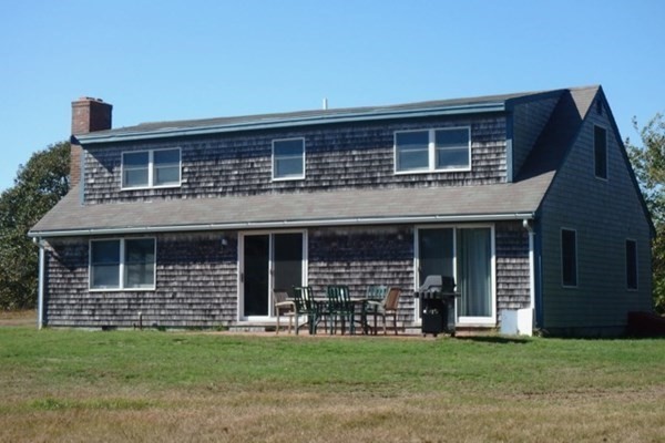 50 A Carl's Way West Tisbury, MA 02568 - Photo 19 of 19 a front view of a house with a yard