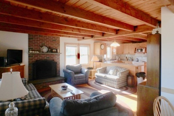 50 A Carl's Way West Tisbury, MA 02568 - Photo 6 of 19 a living room with furniture and a fireplace