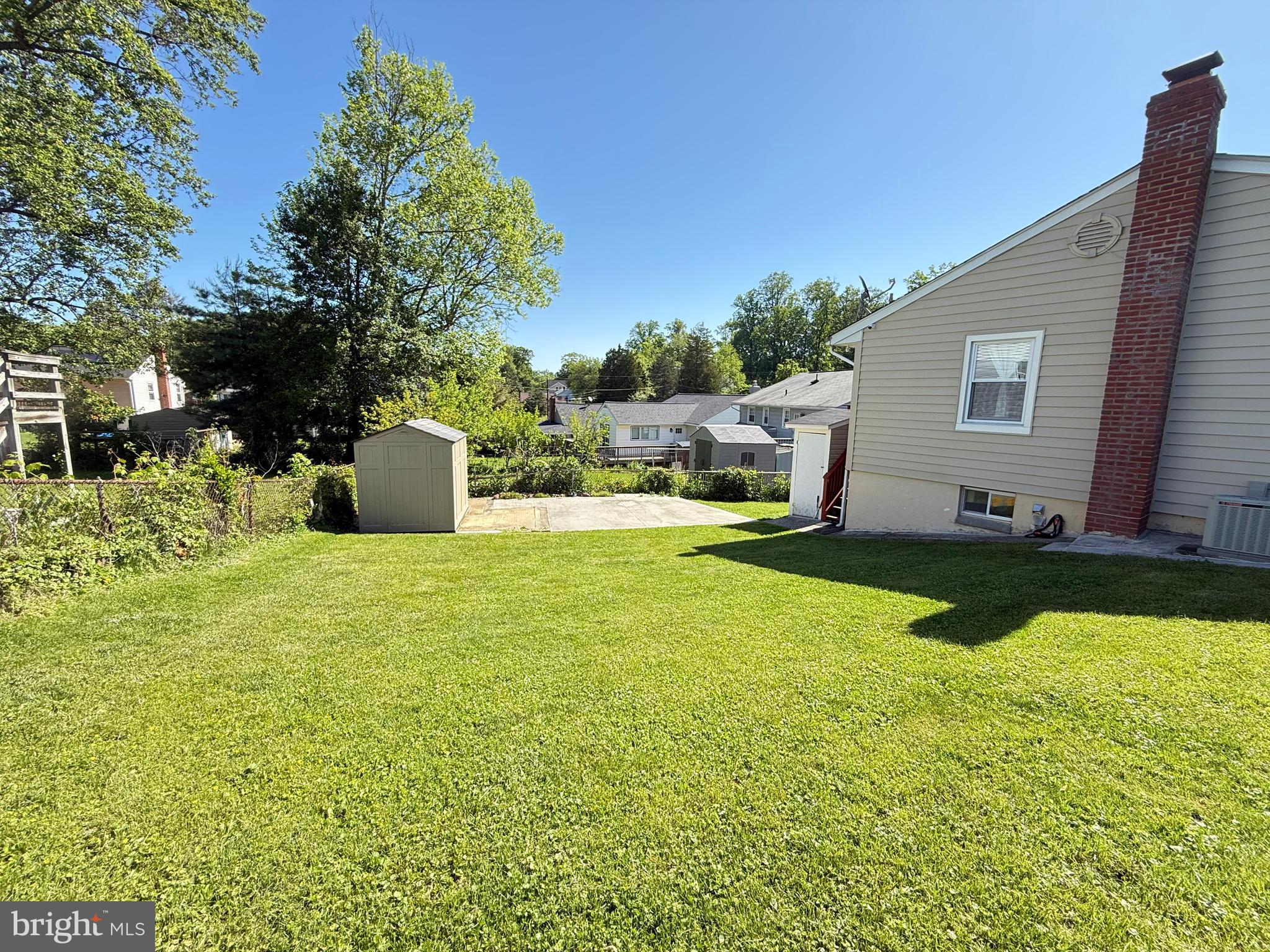 11601 Veirs Mill Road Wheaton, MD 20902 - Photo 27 of 30 a view of a house with backyard and sitting area