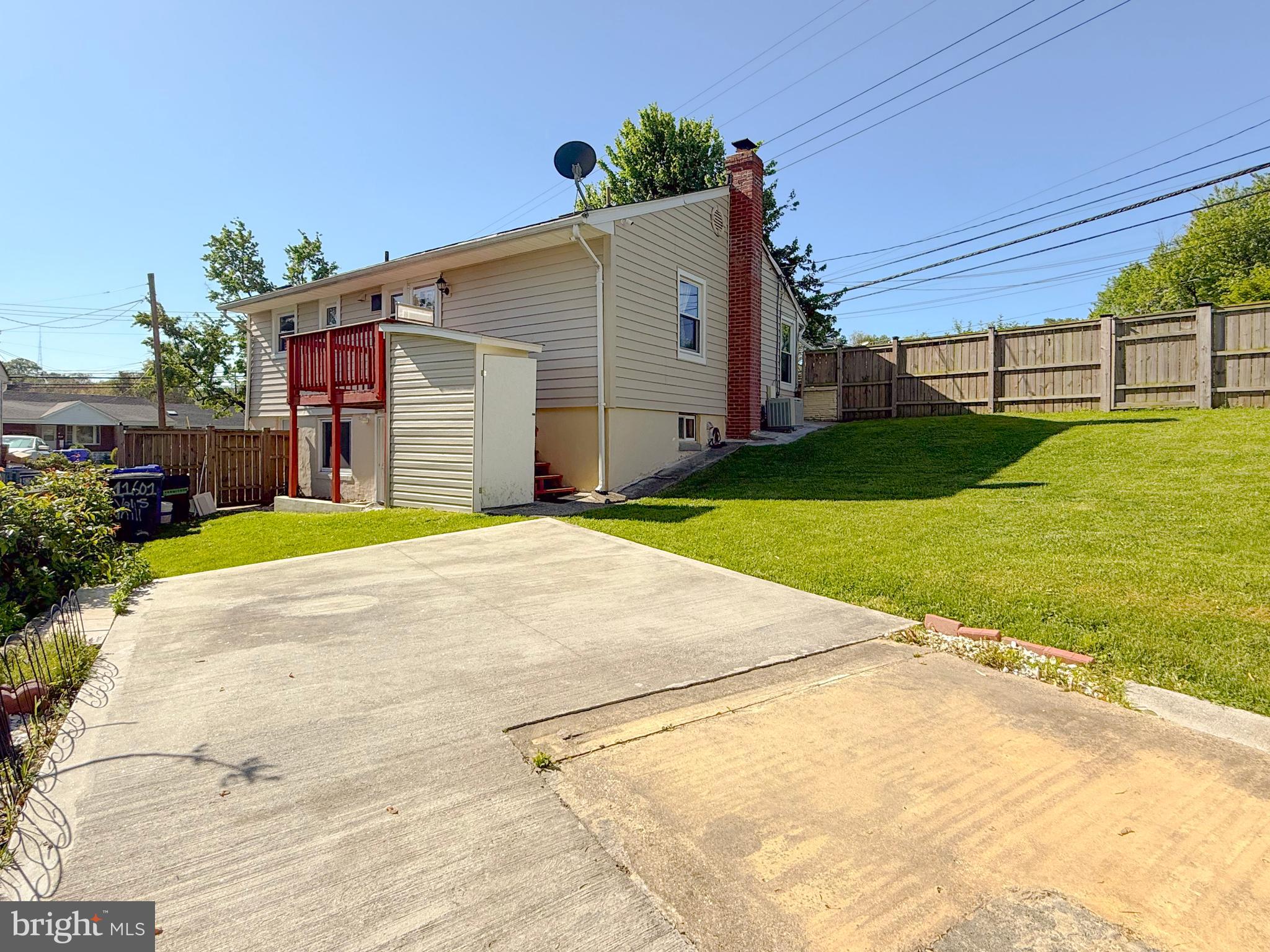 11601 Veirs Mill Road Wheaton, MD 20902 - Photo 28 of 30 a view of a backyard of the house