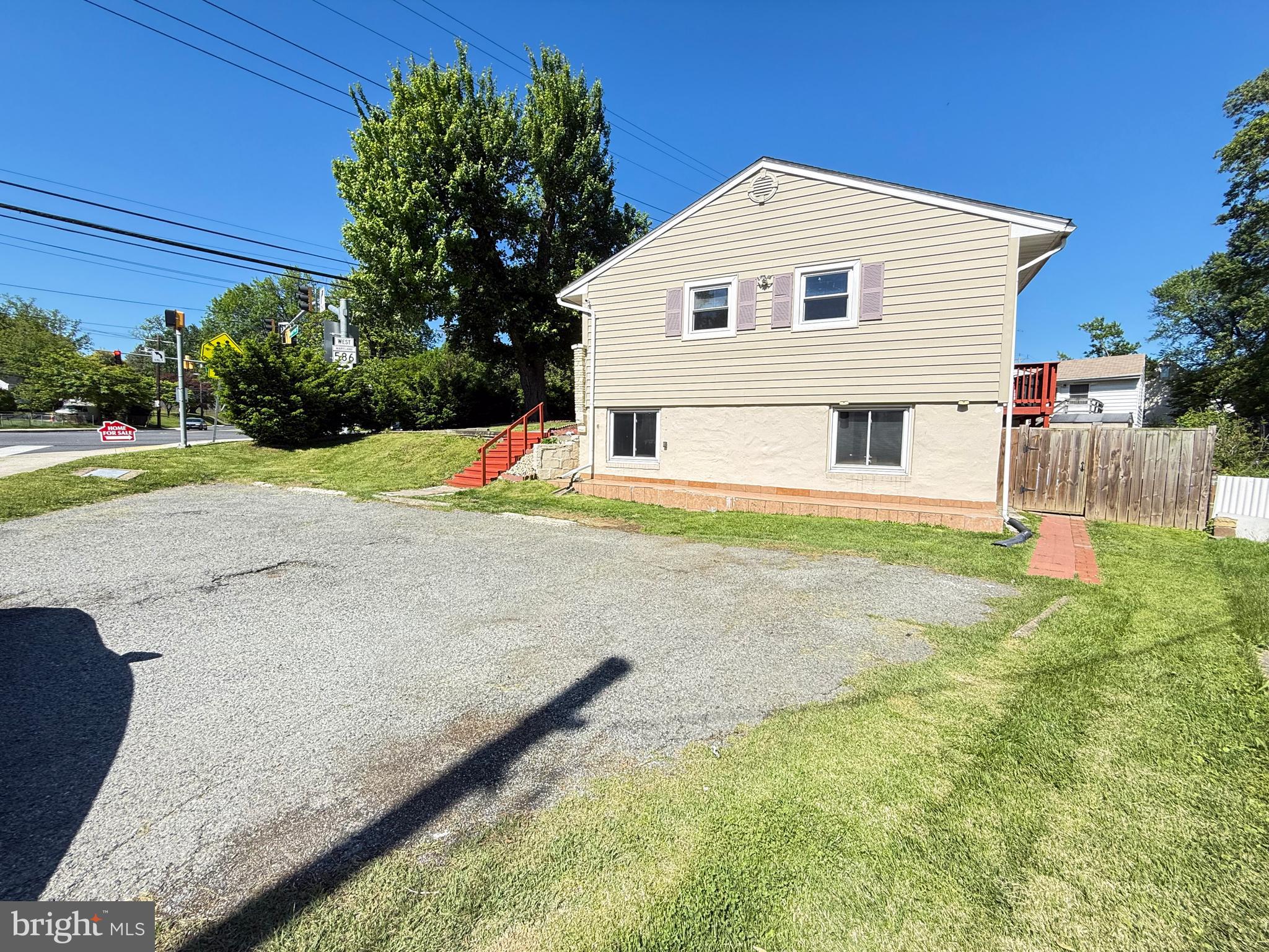 11601 Veirs Mill Road Wheaton, MD 20902 - Photo 30 of 30 a view of a house with backyard and sitting area