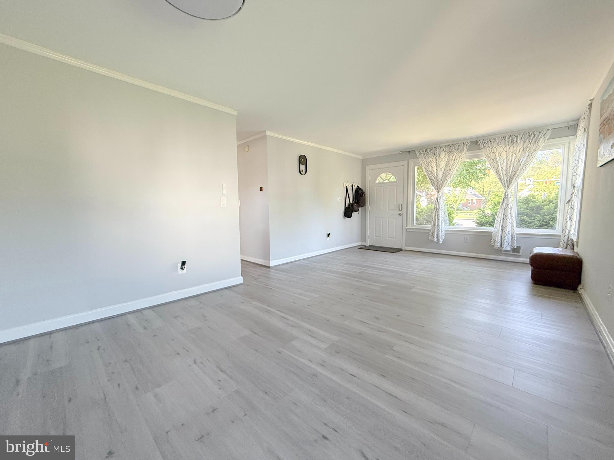 11601 Veirs Mill Road Wheaton, MD 20902 - Photo 5 of 30 an empty room with windows and view