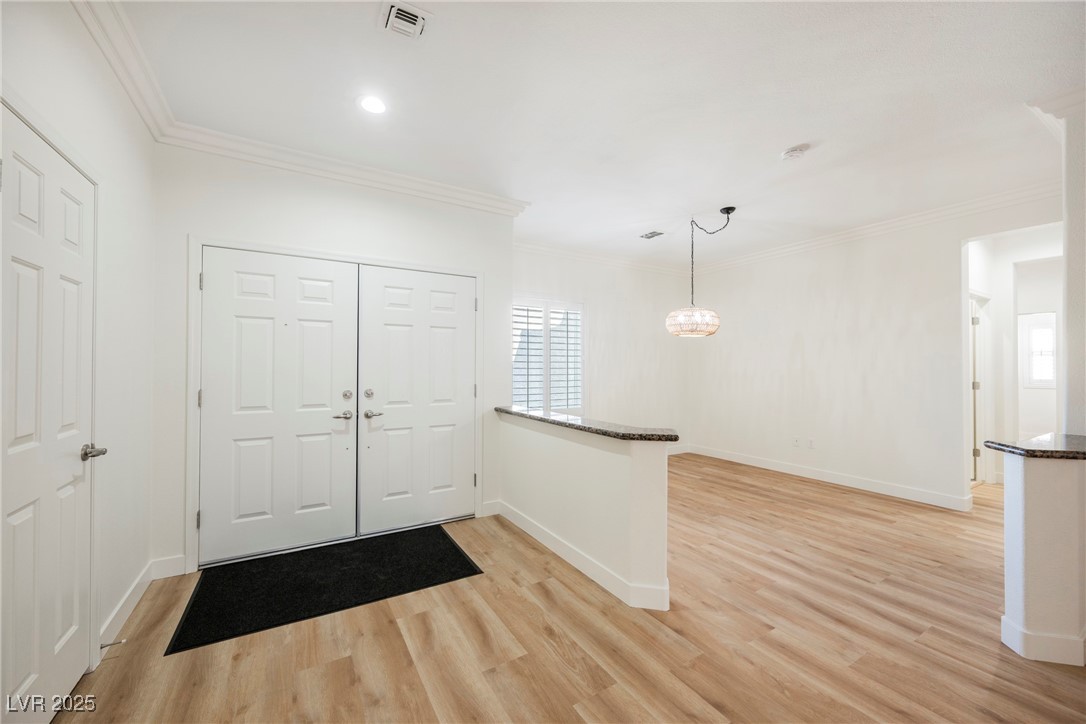1596 Fieldbrook Street Henderson, NV 89052 - Photo 12 of 56 Foyer showing living room at front of home.