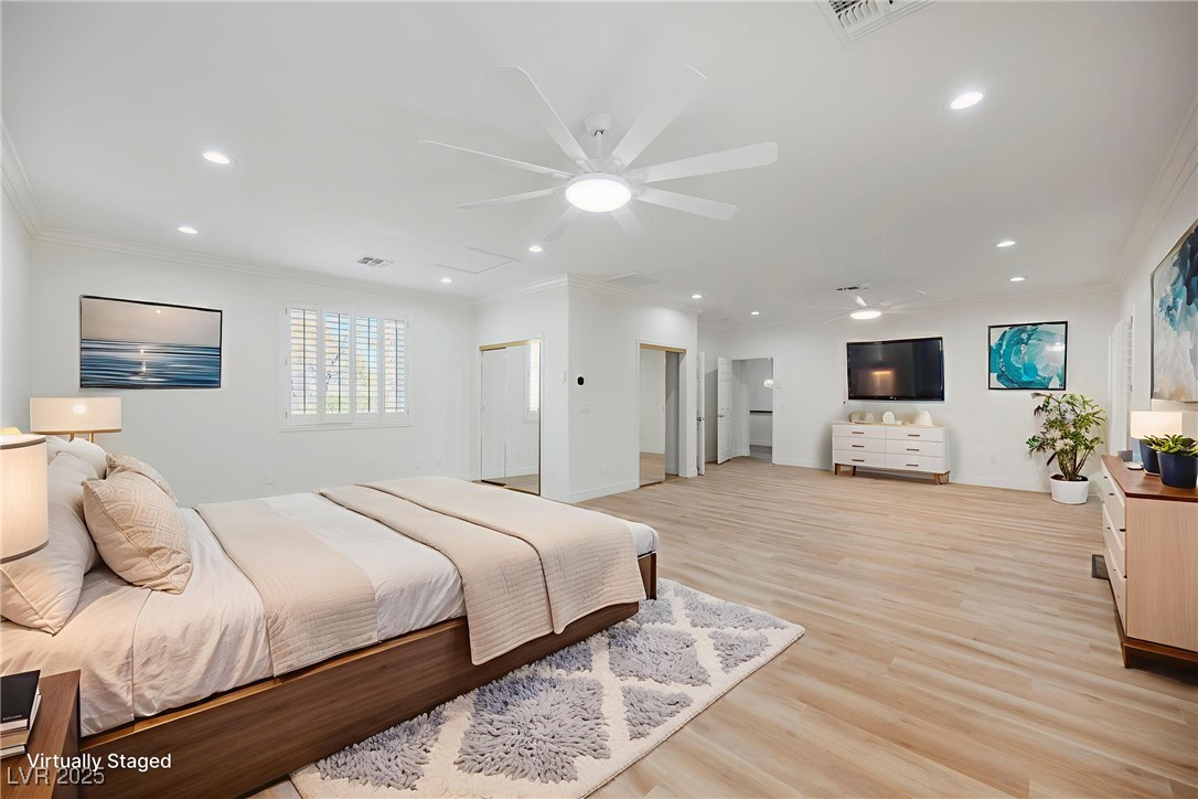 1596 Fieldbrook Street Henderson, NV 89052 - Photo 15 of 56 Virtually staged spacious primary suite with plenty of room to add sitting area. Three closets including one custom walk-in closet for plenty of storage.