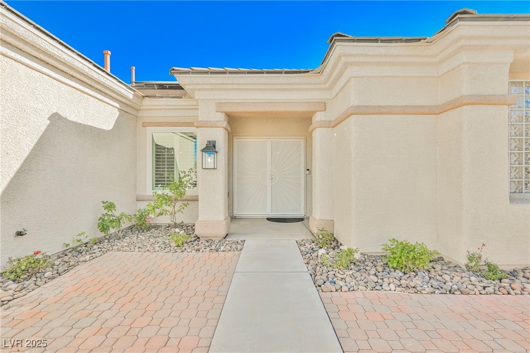 1596 Fieldbrook Street Henderson, NV 89052 - Photo 40 of 56 Gated courtyard with paver patio entry welcomes family and friends to 1596 Fieldbrook Street.