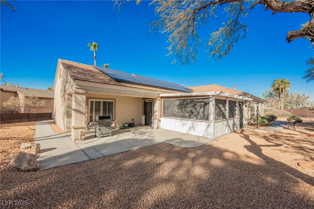 1596 Fieldbrook Street Henderson, NV 89052 - Photo 41 of 56 Back of home showing extended patio space and size of lot. This home sits on a 0.29 acre lot!