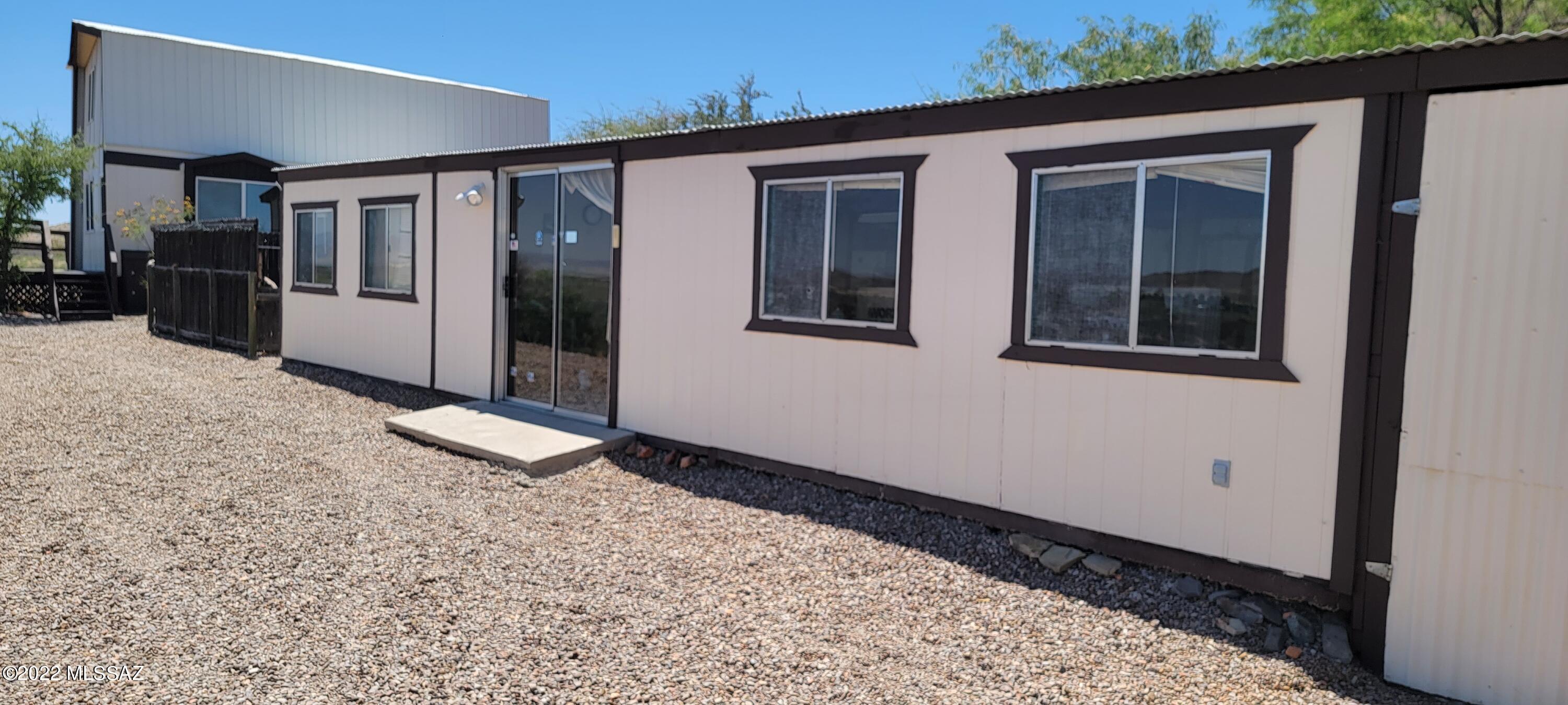 3399 Red Stag Road Pearce, AZ 85625 - Photo 6 of 47 a view of a house with a yard
