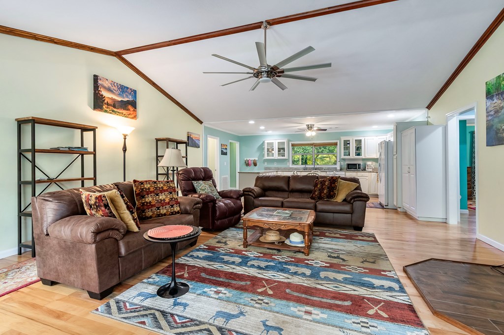 615 Little Ranger Road Murphy, NC 28906 - Photo 27 of 97 a living room with furniture a ceiling fan and a rug