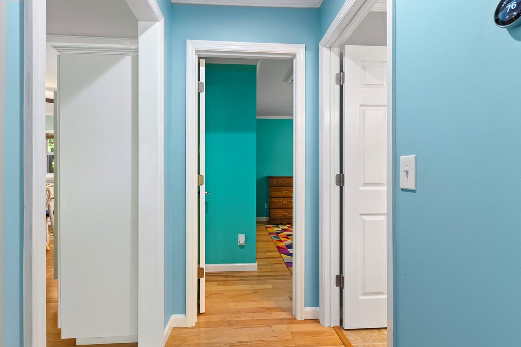 615 Little Ranger Road Murphy, NC 28906 - Photo 42 of 97 a view of a hallway with wooden floor and a bathroom