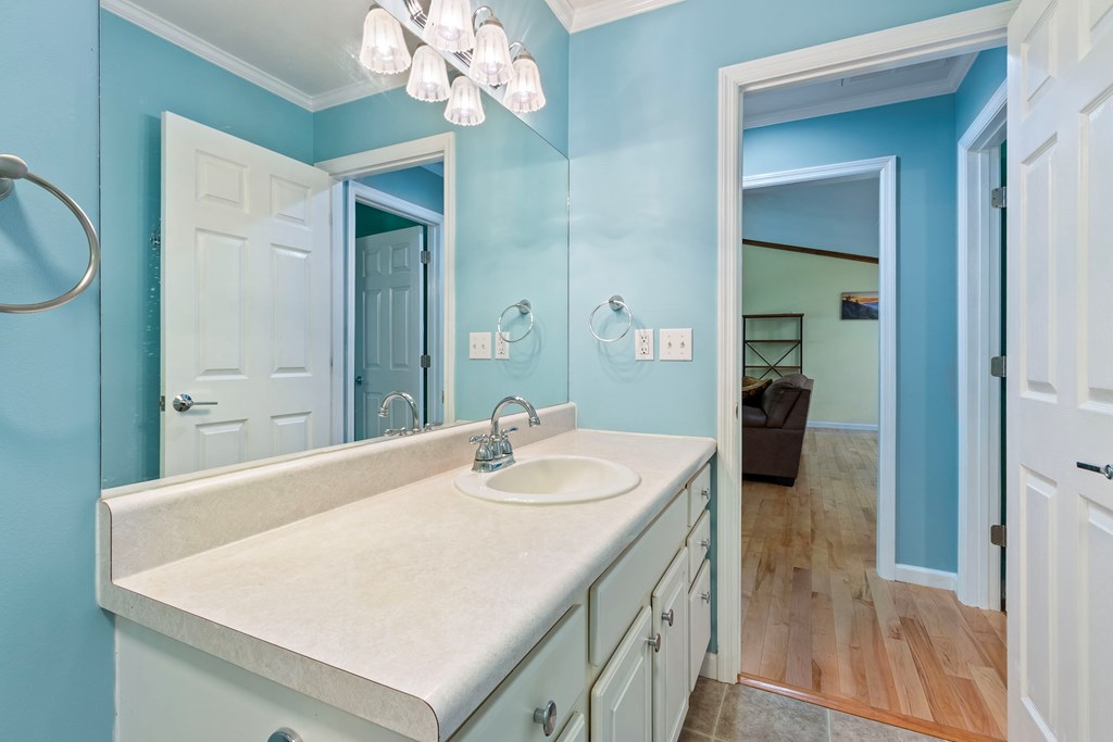 615 Little Ranger Road Murphy, NC 28906 - Photo 48 of 97 a bathroom with a sink a vanity and a mirror