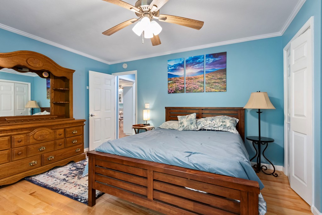 615 Little Ranger Road Murphy, NC 28906 - Photo 51 of 97 a bedroom with a bed and a dresser