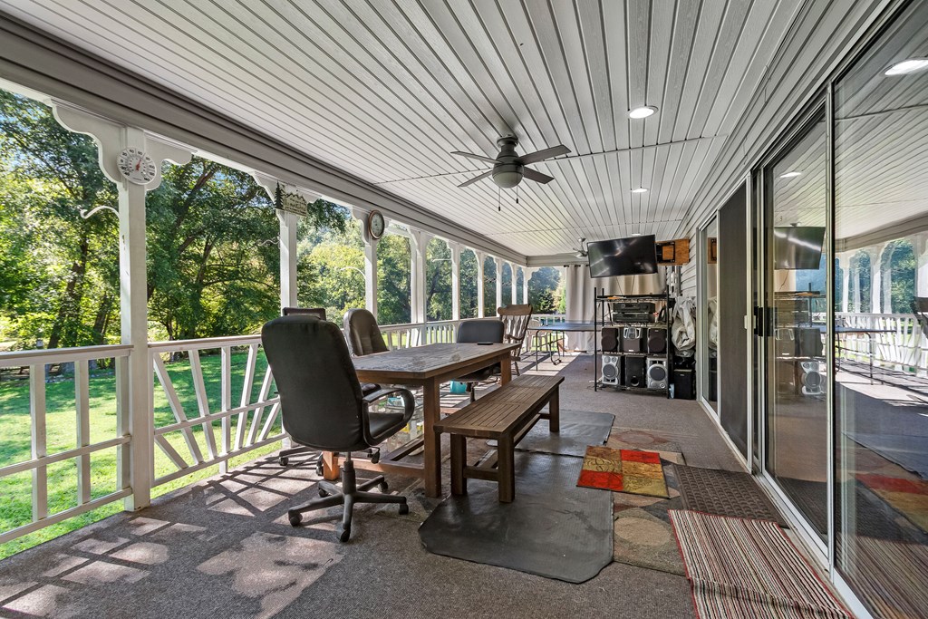 615 Little Ranger Road Murphy, NC 28906 - Photo 58 of 97 a view of a dining room with furniture window and outside view