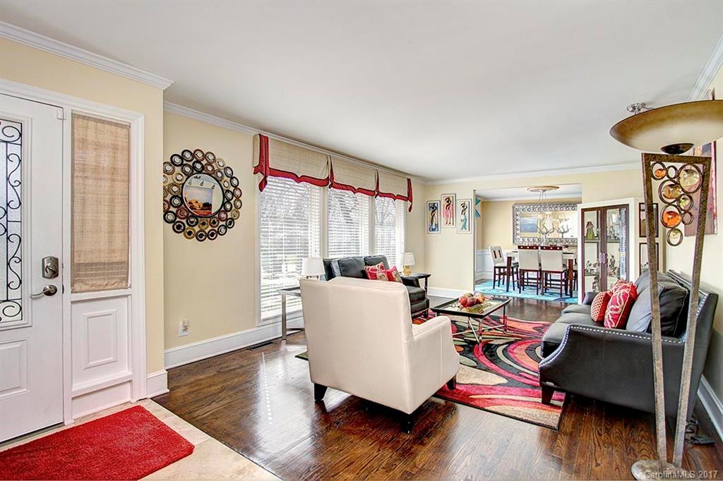 918 Lansdowne Road Charlotte, NC 28270 - Photo 11 of 24 a living room with furniture and a large window