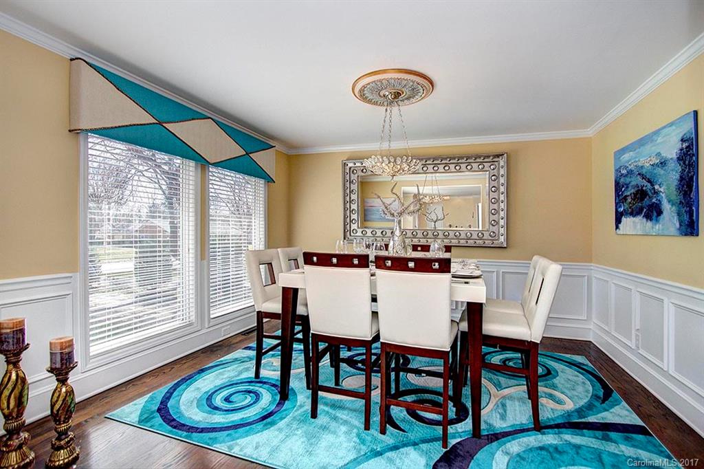 918 Lansdowne Road Charlotte, NC 28270 - Photo 13 of 24 a view of a dining room with furniture window and wooden floor