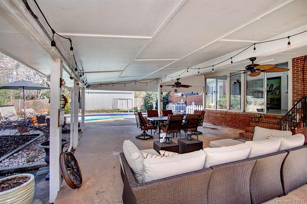 918 Lansdowne Road Charlotte, NC 28270 - Photo 20 of 24 a view of a dining room with furniture window and outside view