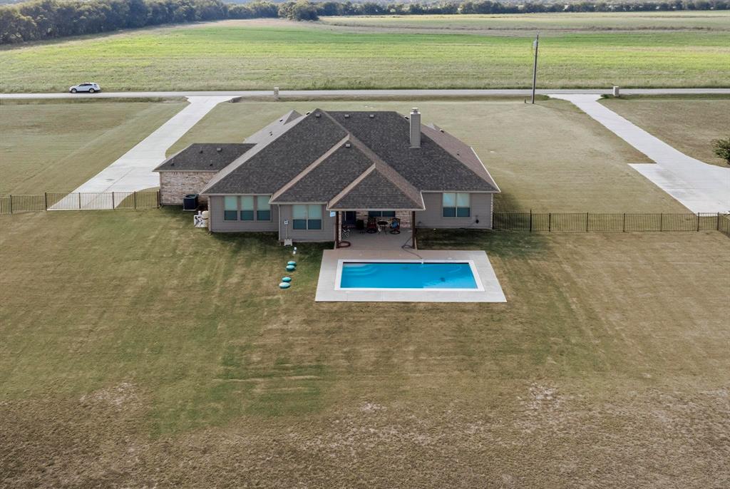 634 Gant Road Sherman, TX 75090 - Photo 2 of 40 Aerial view of sparsely populated area featuring a pool area