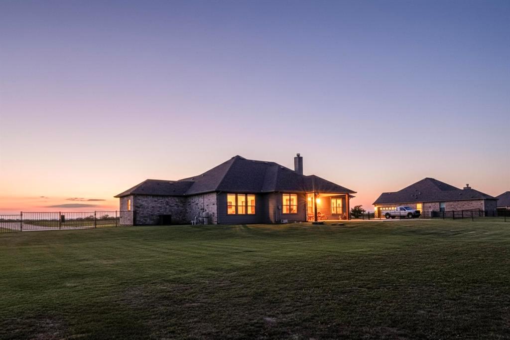 634 Gant Road Sherman, TX 75090 - Photo 40 of 40 Rear view of property featuring a chimney and a patio area