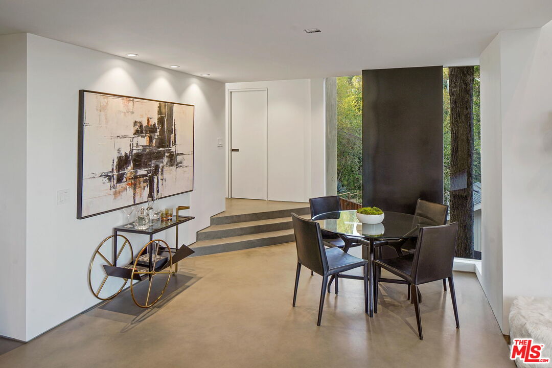 7187 Macapa Drive Los Angeles, CA 90068 - Photo 17 of 39 a view of a livingroom with furniture and window