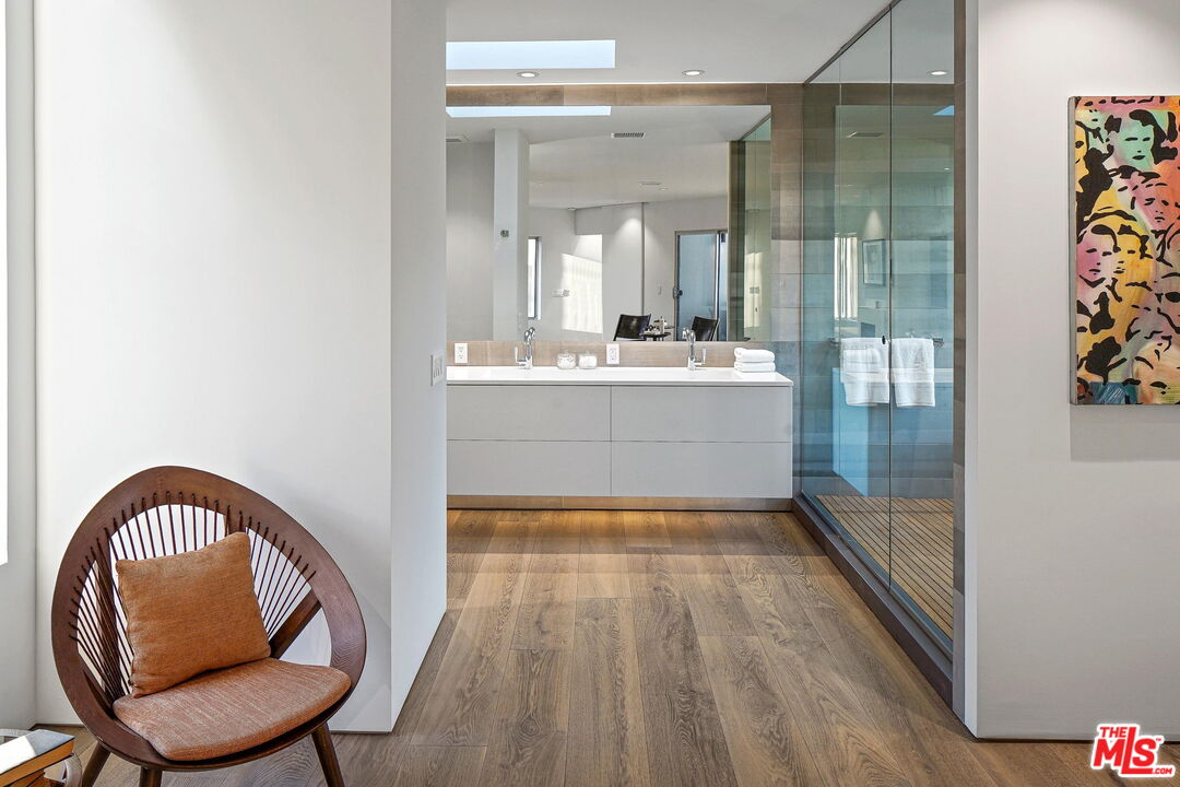 7187 Macapa Drive Los Angeles, CA 90068 - Photo 25 of 39 a large white kitchen with a large window