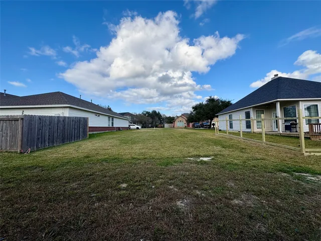 a view of a house with a big yard