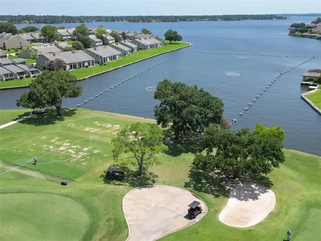 a view of a lake with a building in the background