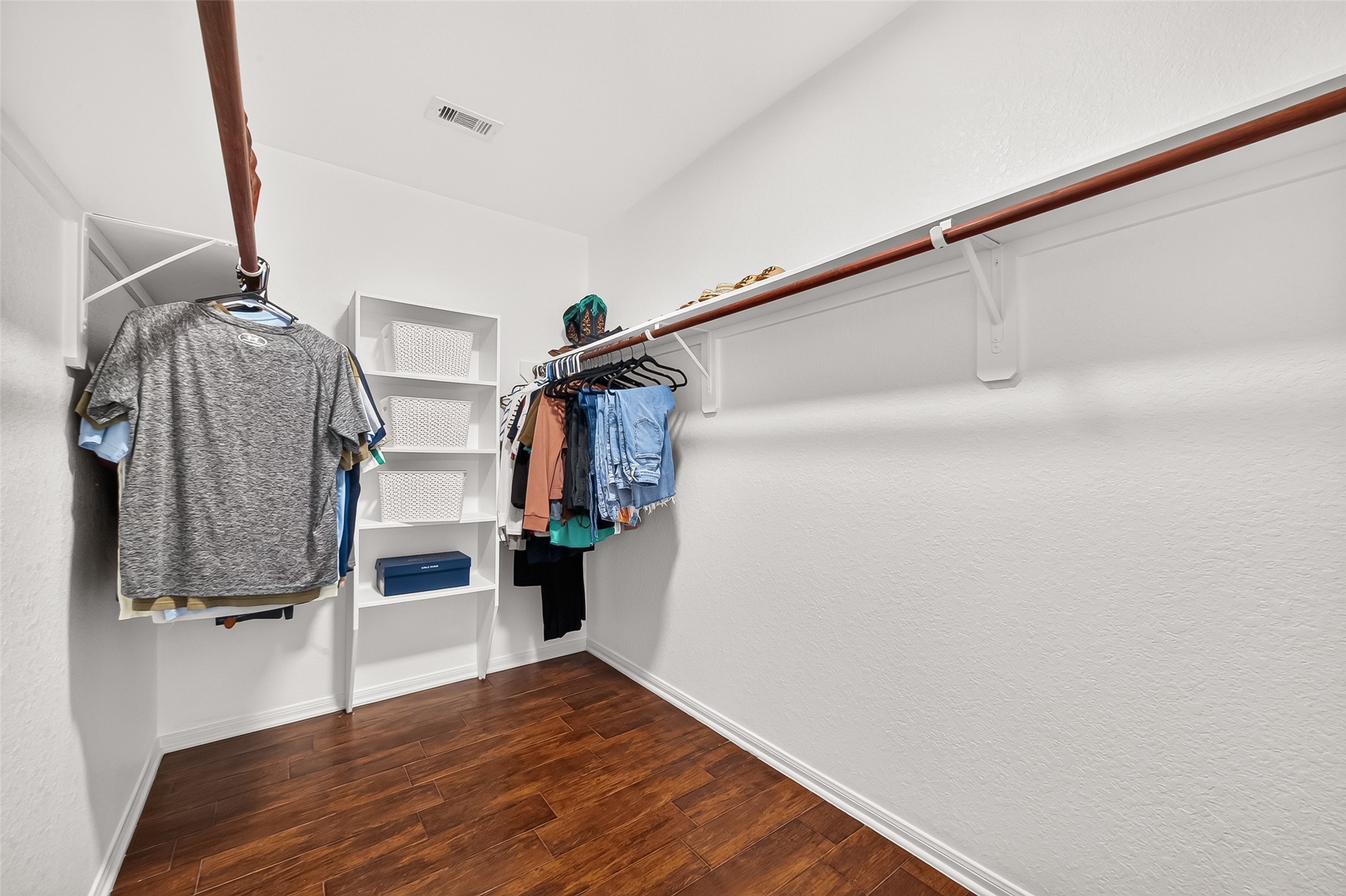 3155 View Valley Trail Katy, TX 77493 - Photo 37 of 50 Expansive walk-in primary closet offering abundant built-in shelving and hanging storage
