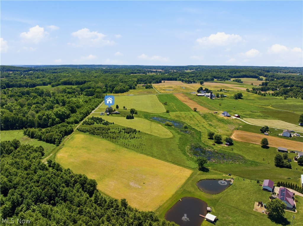 12159 Lawndell Road Southwest Beach City, OH 44608 - Photo 38 of 49 Expansive property featuring varied terrain including wooded areas, open fields, and two distinct ponds