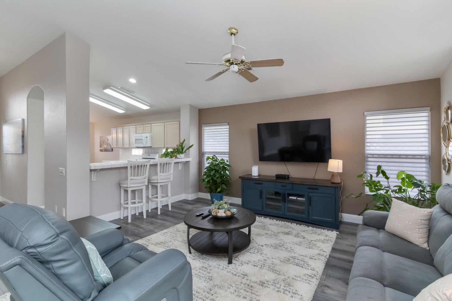 7597 Timberrose Way Roseville, CA 95747 - Photo 15 of 30 a living room with furniture and a flat screen tv