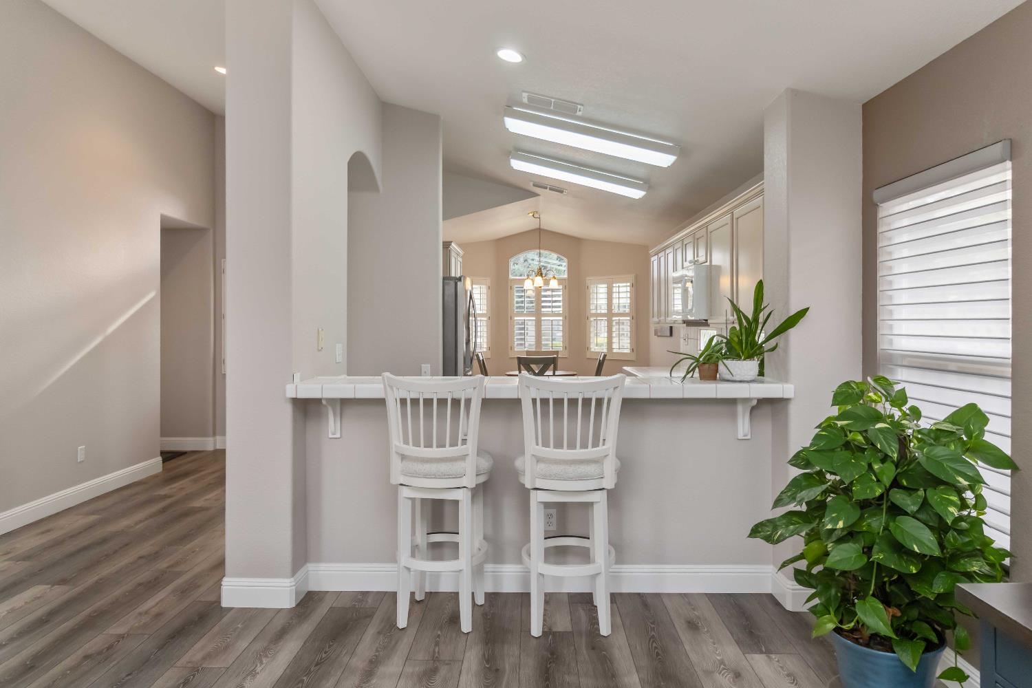 7597 Timberrose Way Roseville, CA 95747 - Photo 17 of 30 a view of a livingroom with furniture window and wooden floor