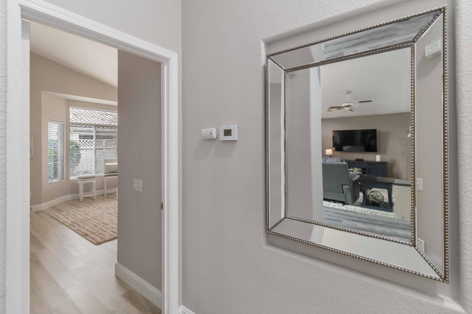 7597 Timberrose Way Roseville, CA 95747 - Photo 19 of 30 a view of a bathroom from a hallway