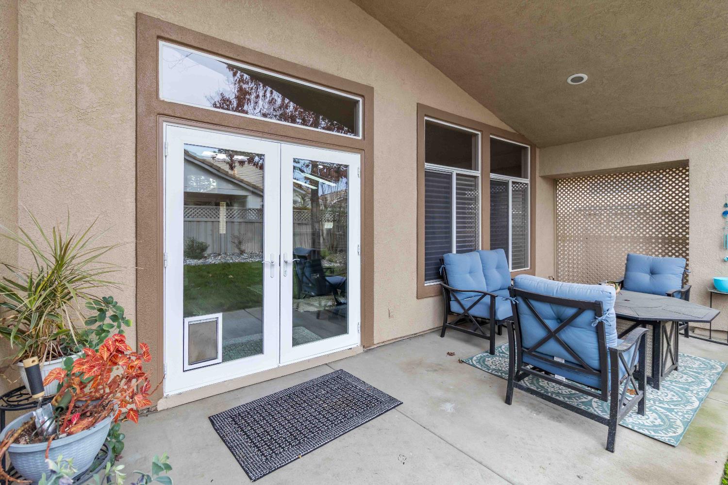 7597 Timberrose Way Roseville, CA 95747 - Photo 27 of 30 a view of a entryway door of the house
