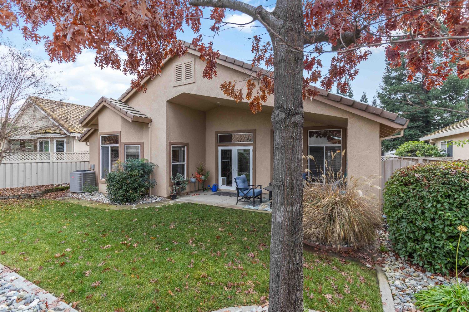 7597 Timberrose Way Roseville, CA 95747 - Photo 29 of 30 a front view of a house with a yard and porch