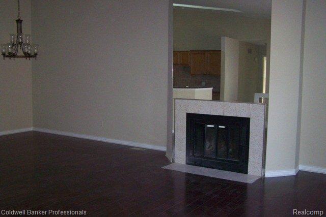 40000 Crosswinds Road, Unit 45 Novi, MI 48375 - Photo 5 of 21 Living Room-Fireplace