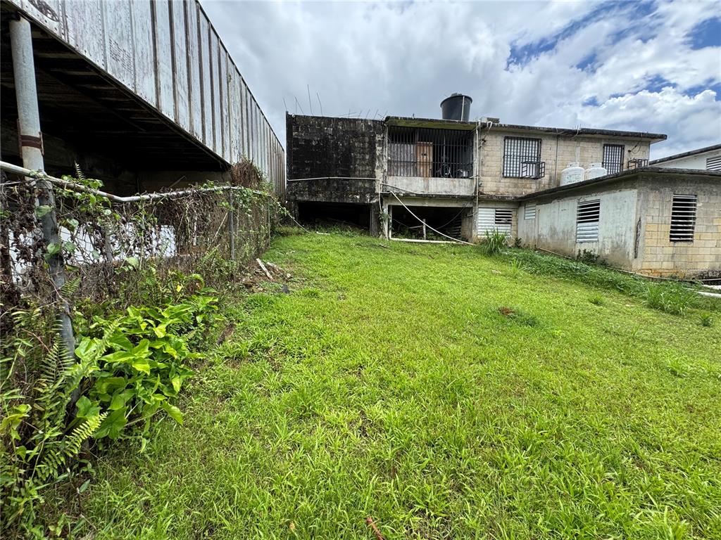 140 Km 38.9 Utuado, Utuado 00641 - Photo 11 of 55 a view of a house with a garden