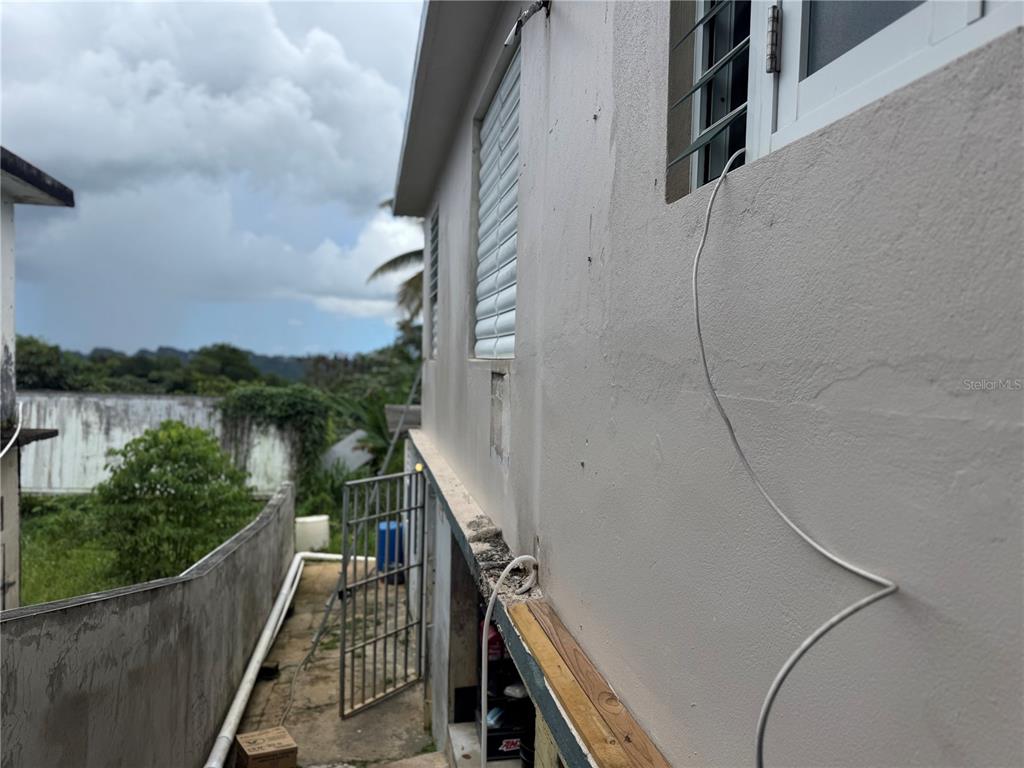 140 Km 38.9 Utuado, Utuado 00641 - Photo 16 of 55 a view of balcony with wooden floor and lake view