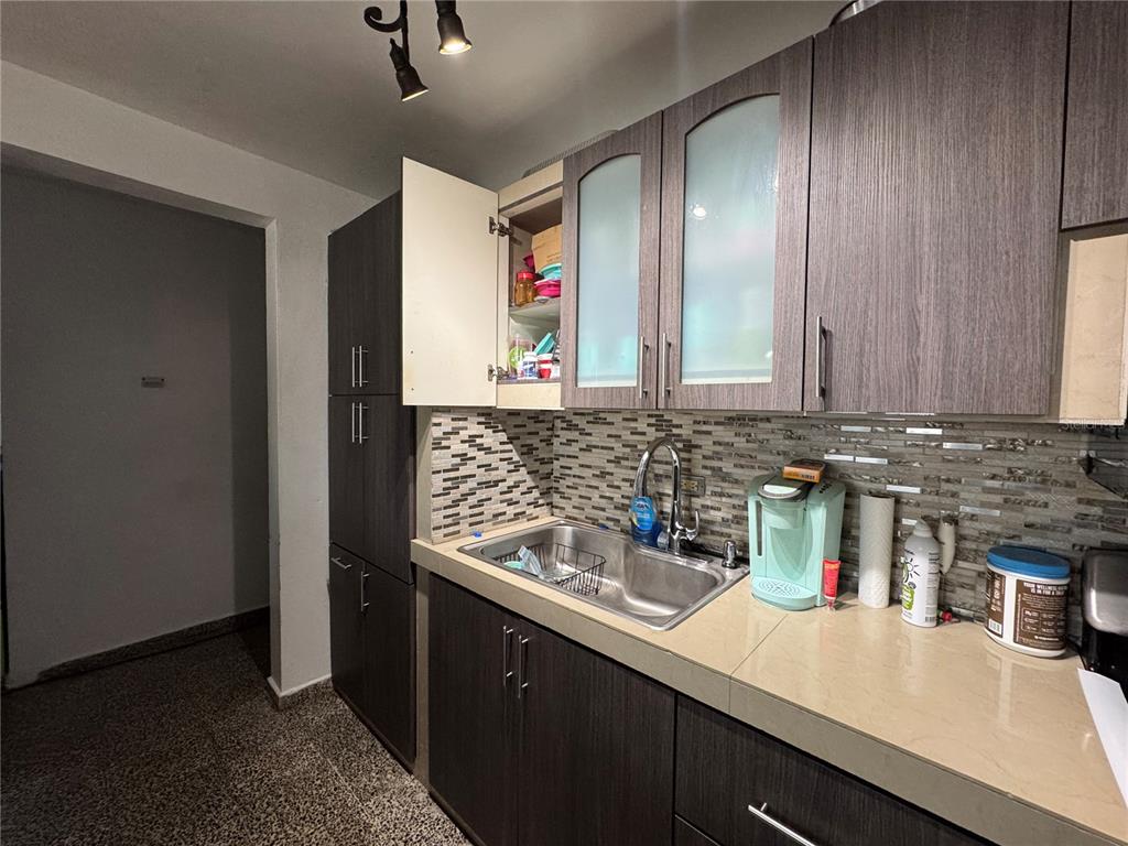 140 Km 38.9 Utuado, Utuado 00641 - Photo 29 of 55 a kitchen with a sink and cabinets