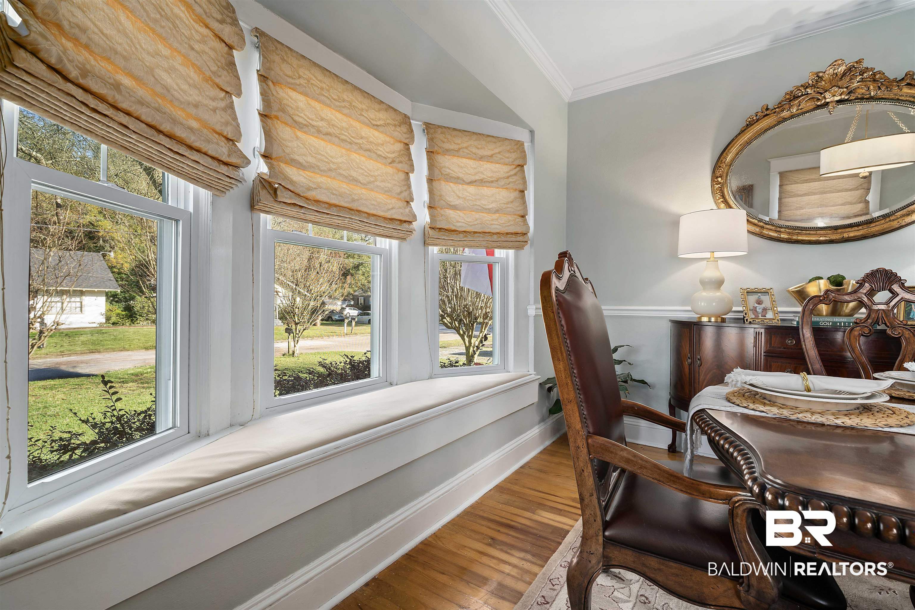 168 Mohawk Street Mobile, AL 36606 - Photo 15 of 31 Dining room featuring crown molding and wood finished floors