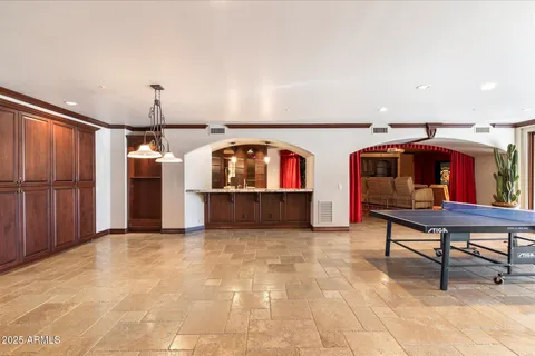 a view of an entryway with a workspace