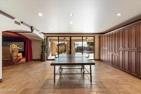 a living room with furniture fireplace and a flat screen tv